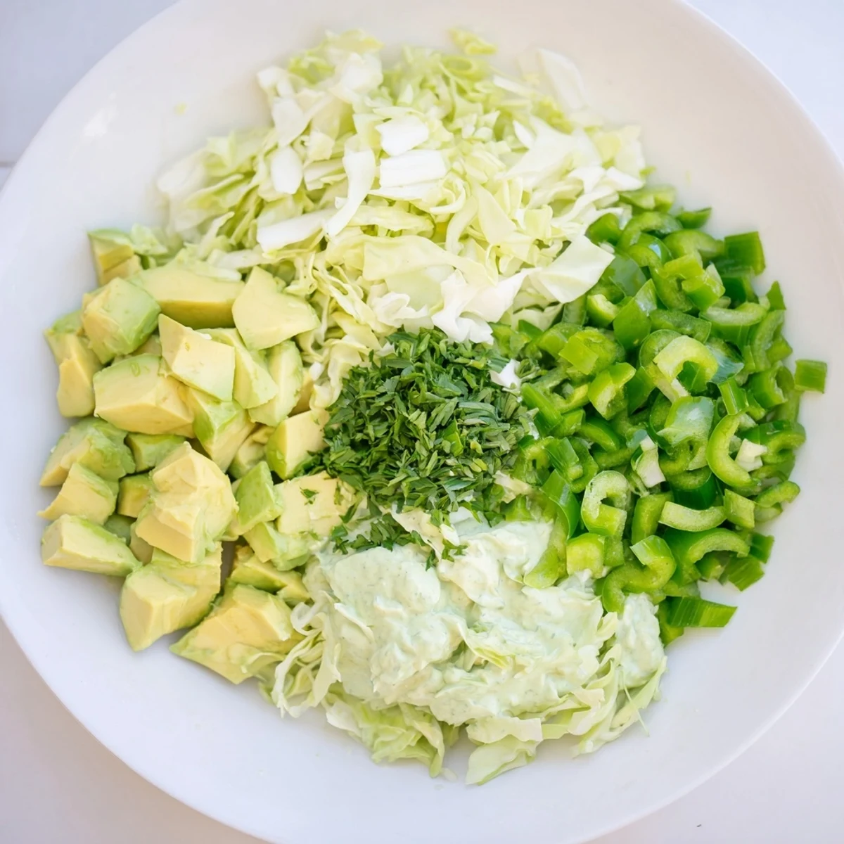 Served in a rustic bowl, this Green Goddess Salad makes a perfect light lunch or side dish.