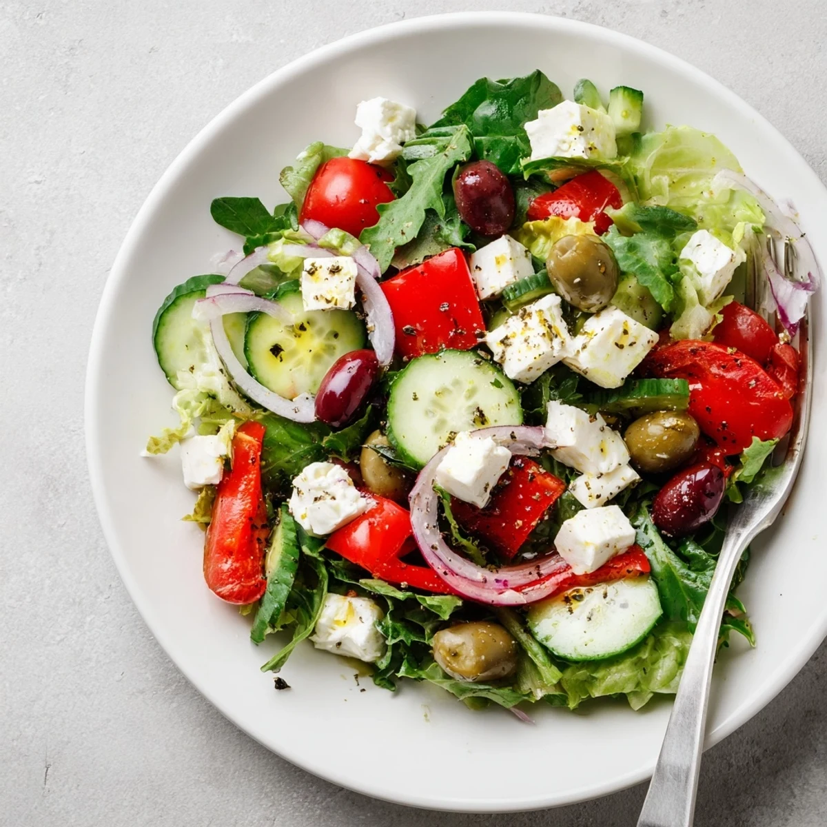 Bright bowl of mixed greens in this Fresh Salad Recipe, tossed and chilled.