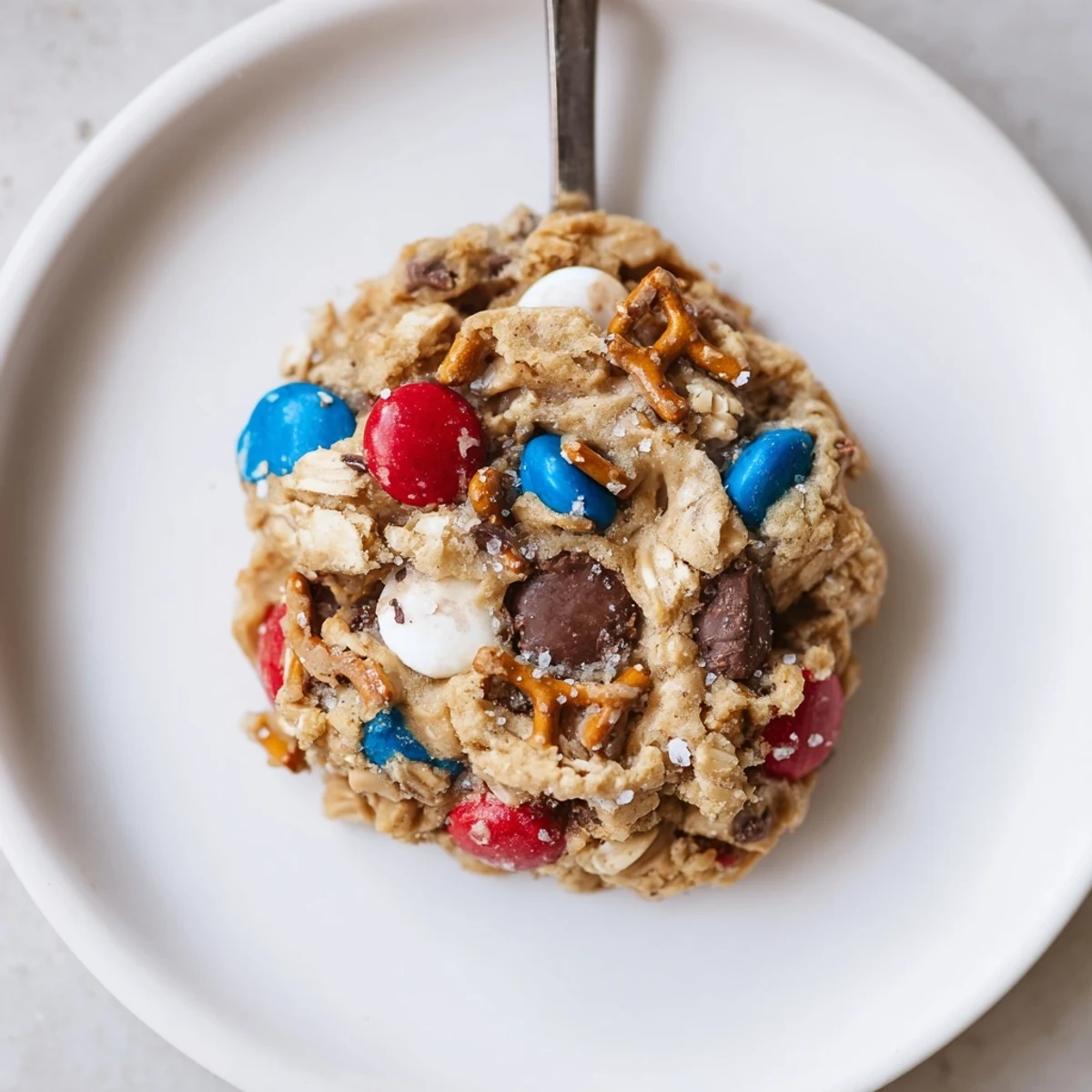 Warm Patriotic Monster Cookies Recipe cooling on wire rack, chocolate chips glistening