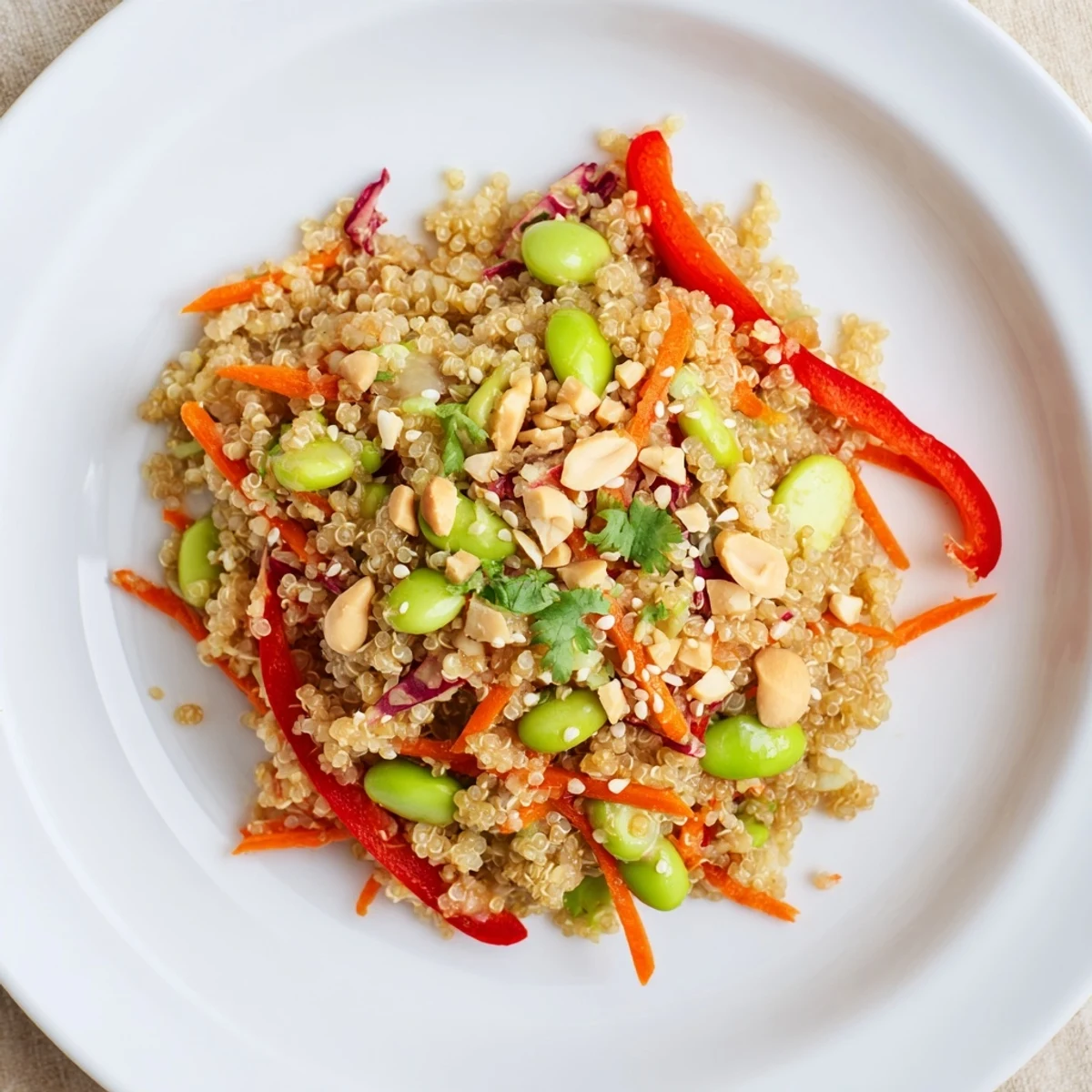 Lime-tangy veggies, fluffy quinoa, and cilantro garnish in Asian Dressing Quinoa Salad