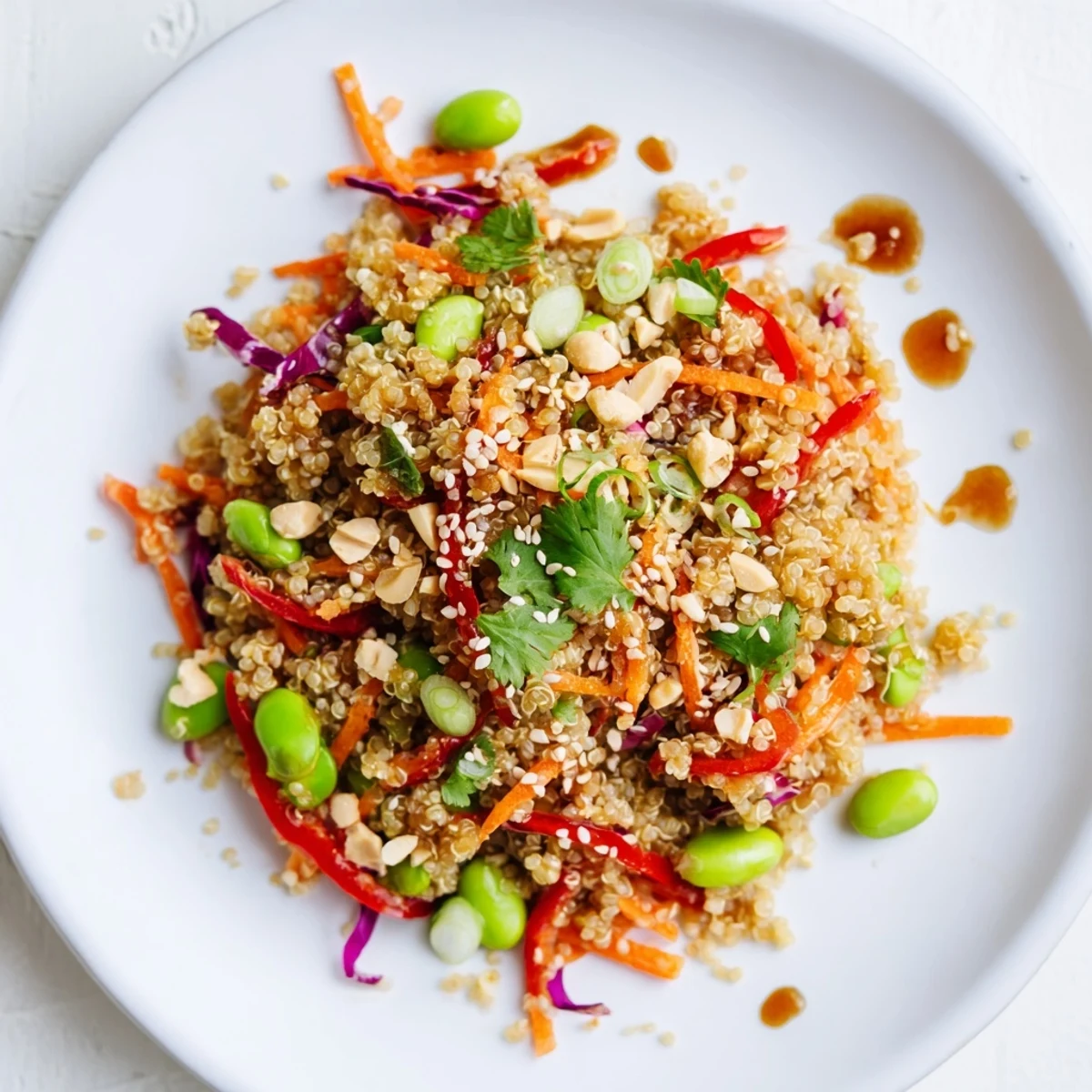 Bright, crunchy bowl of Asian Dressing Quinoa Salad tossed with toasted sesame